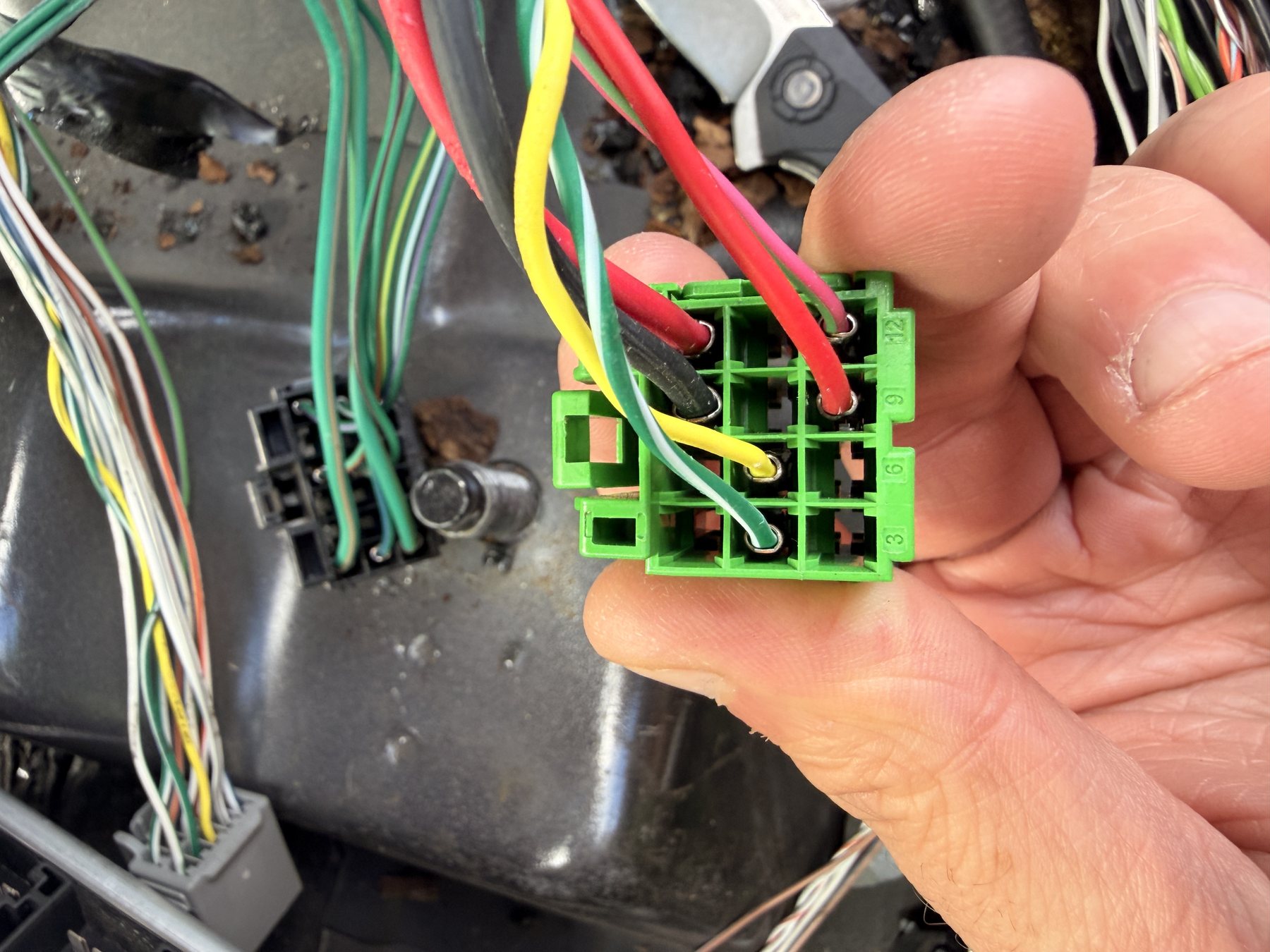 The C3 green 12-cavity connector, the only one of the three that carries battery power