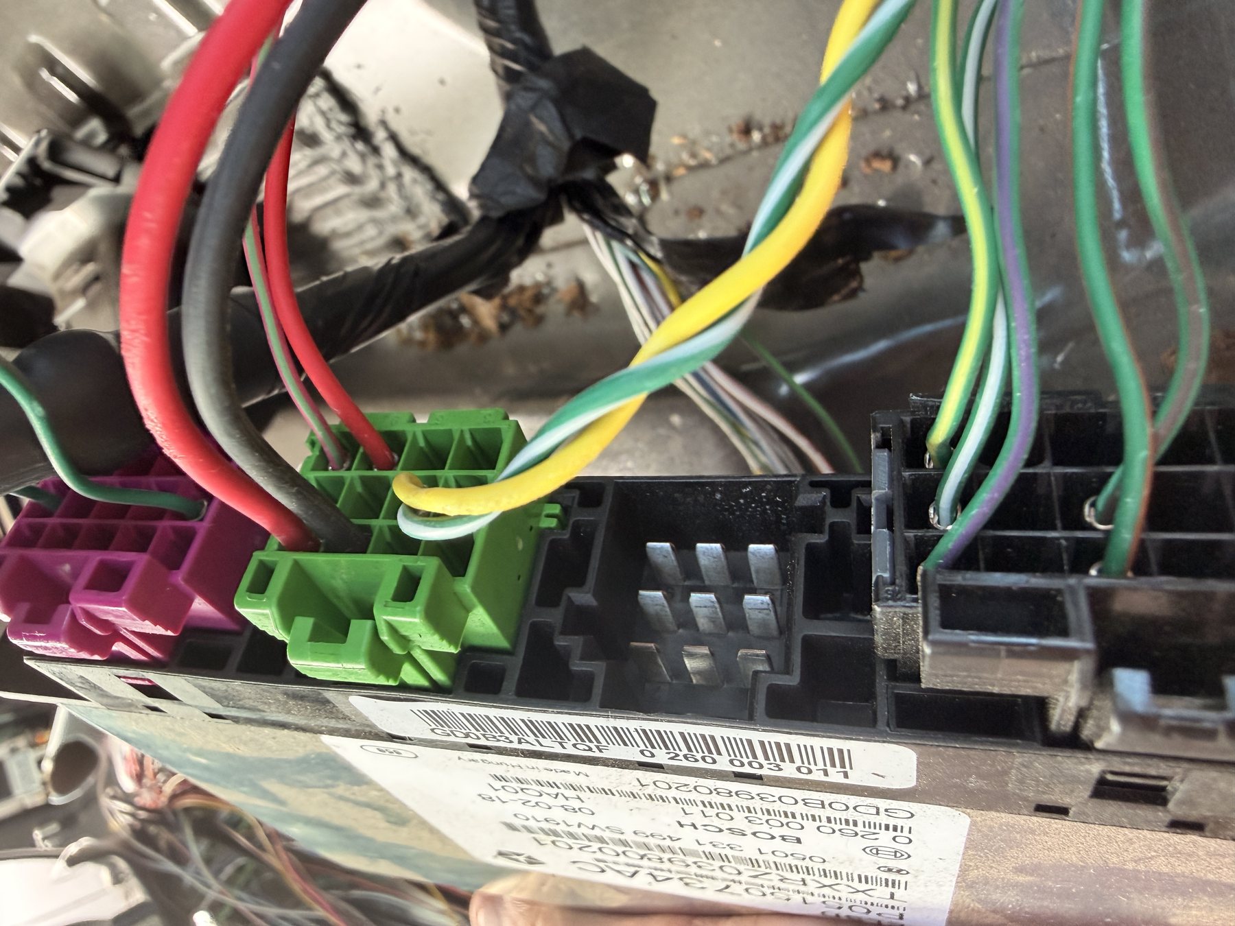 The three eLSD module connectors — pink, green and black — with their wire bundles